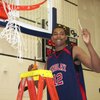 Tristan Thompson, a junior power forward who transferred to Findlay Prep from St. Benedict's in New Jersey in February, holds a piece of the net that he had just cut after helping the Pilots beat Oak Hill, 74-66, in the championship game of the ESPN RISE National High School Invitational. Thompson had 12 points and a team-best 11 rebounds.