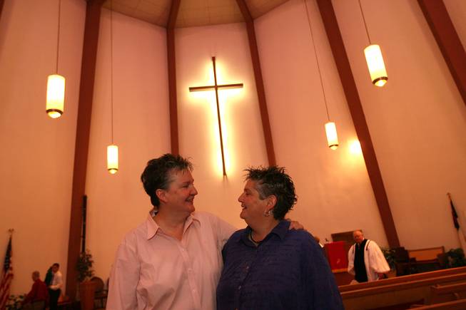 Charlotte Morgan, left, and Julie Liebo, who have been together 19 years, were married in Long Beach, Calif., last year by Las Vegas Pastor Dave Krueger-Duncan, of the Northwest Community Church, before voters closed the door to same sex marriages in November.
