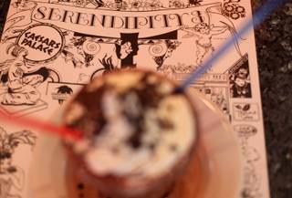 A frrrozen hot chocolate, the restaurant's famous dessert, sits on the counter. This Serendipity 3, which opened Monday, is based off the original Serendipity 3 in New York City.