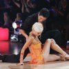 In this image released by ABC, Dmitry Chaplin helps his dance partner Holly Madison from the dance floor during the broadcast of ABC's "Dancing with the Stars," Monday, March 9, 2009, in Los Angeles. 