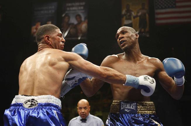 Boxers Winky Wright (left) and Paul Williams battle it out during a middleweight fight at the Mandalay Bay Events Center April 11, 2009.