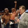 Paul Williams celebrates with his son Paul Williams Jr., 6, and boxing promoter Dan Goossen after defeating Winky Wright Saturday night at the Mandalay Bay Event Center.