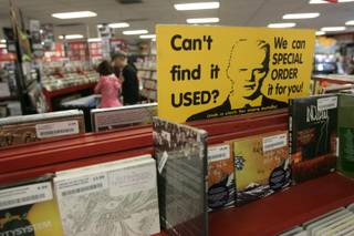 Customized personal service is a hallmark of independent record stores, as this sign advertises at Zia Records Wednesday, April 15, 2009.  