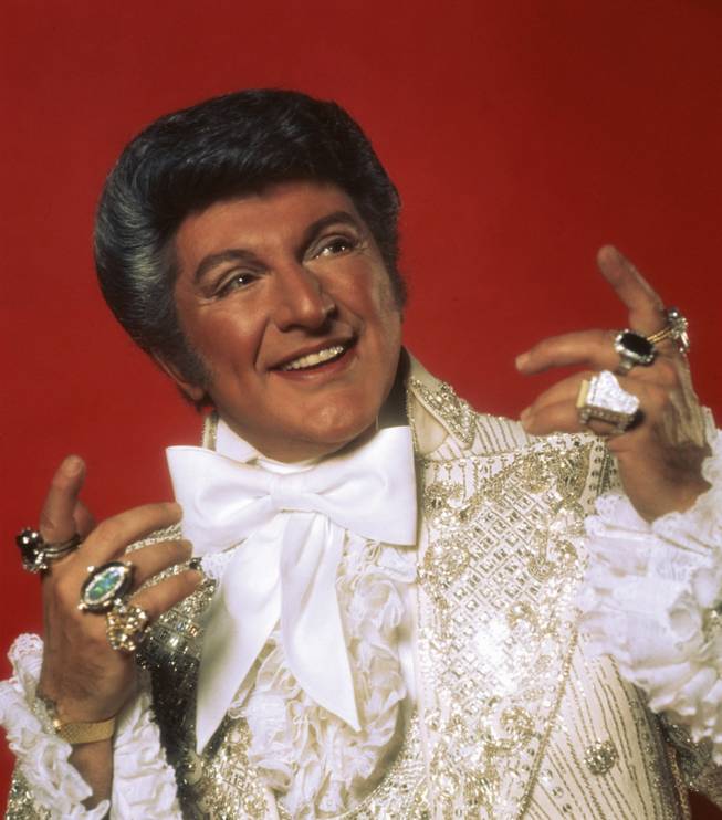 Liberace, a man and his rings.