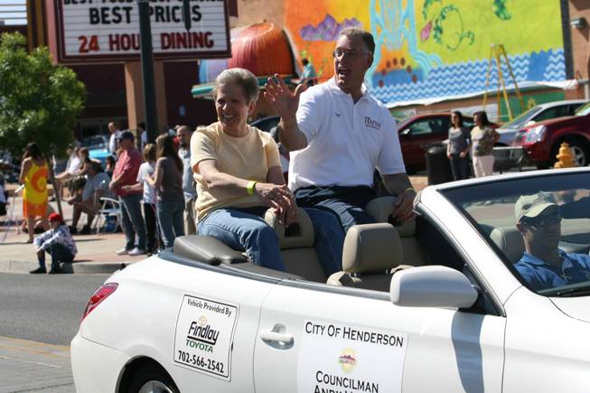 Henderson Mayoral candidate Andy Hafen and his wife Debi ride in a car during Henderson's annual Heritage Parade.