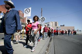 Protesters leave from the starting point near Audrie Street and East Flamingo Road during a rally and march down the Las Vegas Strip to protest the closure of F Street in Las Vegas Saturday, April 18, 2009. 