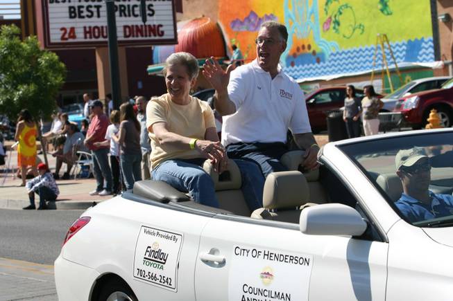 Henderson Mayoral candidate Andy Hafen and his wife Debi ride in a car during Henderson's annual Heritage Parade on Water Street.