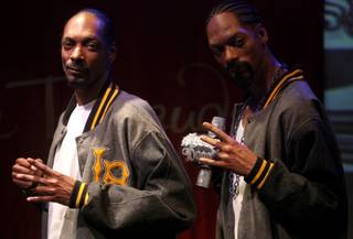 Rapper Snoop Dogg unveils the world's first Snoop Dogg wax figure at Madame Tussauds Las Vegas.