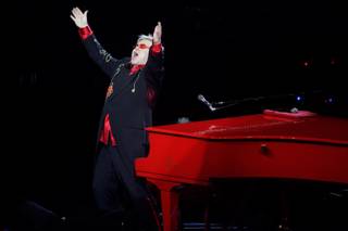 Elton John sings during his final performance of 