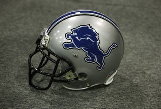 A Detroit Lions helmet is shown with the new team logo in Madison Heights, Mich., Monday April 20, 2009. The team's comprehensive new brand includes a new logo, new uniforms and other branding elements. 
