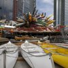 Canoes are kept at the ready as workers install a sculpture by Nancy Rubins at MGM Mirage's City Center project Thursday.