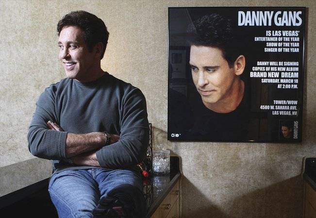 Danny Gans relaxes earlier this year in his dressing room at the Encore Theatre. Gans, a Las Vegas headliner since 1996, signed on to perform there at Steve Wynn's urging.
