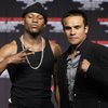 Boxers Juan Manuel Marquez, right, of Mexico, and Floyd Mayweather Jr. face off during a news confer