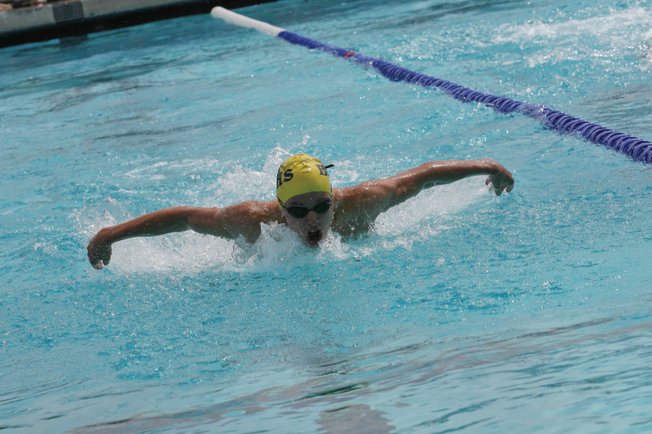 Boulder City sophomore Drew Peterson competes during a swimming meet at the Henderson Multi-Generational Pool Saturday.