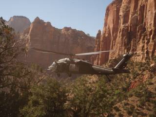 A seven-member crew aboard a HH-60G Pavehawk helicopter from Nellis Air Force Base airlifted an injured 27-year-old man from the canyon slope in Zion Canyon National Park to a waiting ambulance on May 9. The man's climbing rope was not properly secured causing him to fall about 20 feet.