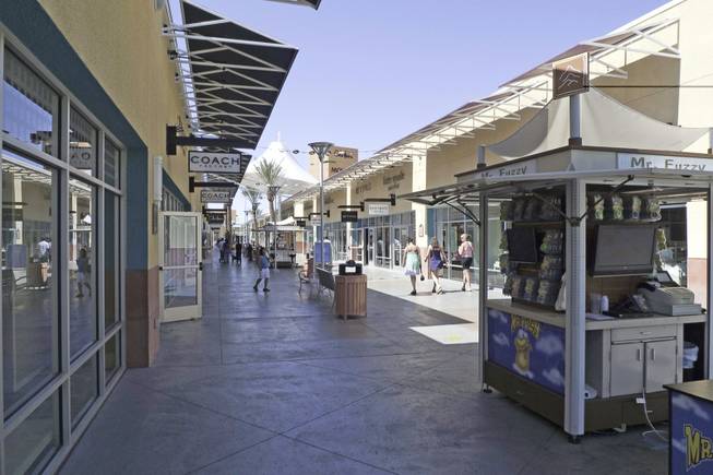 Shoppers are shown at Las Vegas Premium Outlets North.