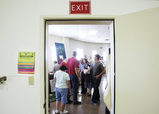 Students and guests browse during Wednesday's art show. Although CSN pays rent of only $1 a year on the center, it says costs such as utilities and personnel make that less of a bargain than it seems.