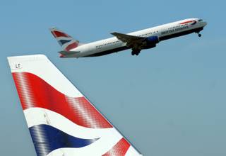 A British Airways jet takes off from Heathrow Airport in London July 16, 2006. 