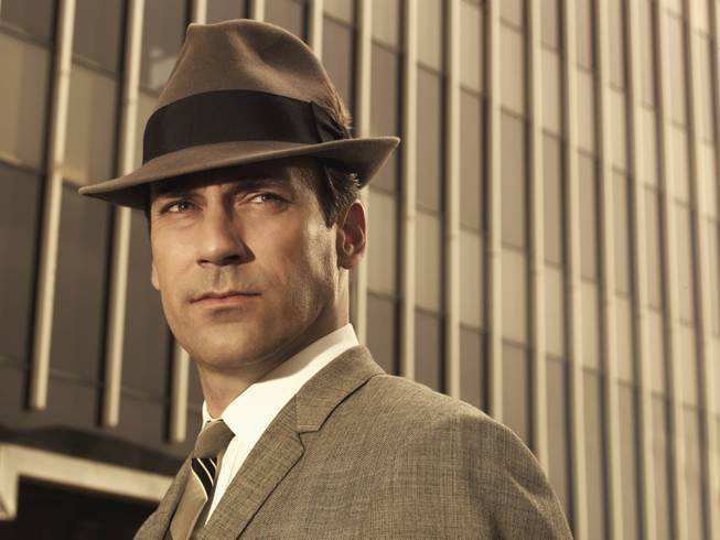  Jon Hamm as Don Draper in "Mad Men".  The show has helped bring back the '60s, including hats.  
