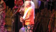 Jimmy Buffett beamed throughout the 2 1/2-hour show, and if he's having fun, how can you not?