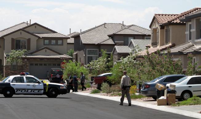 Metro Police investigate what they believe was a suicide-attempted murder case on Perkins Hill Street in northwest Las Vegas.