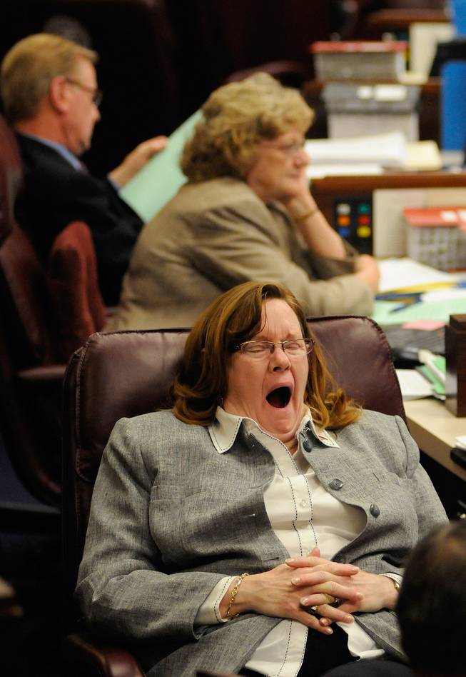 Sen. Maggie Carlton, D-Las Vegas, yawns as a Senate floor session goes late into the night at the Legislature in Carson City on Wednesday, May 20, 2009.
