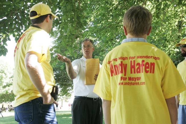 Henderson City Councilman and mayoral candidate Andy Hafen speaks to volunteers May 9 before heading out to canvass. Hafen, a Democrat, says although voting to raise taxes is something he can't imagine doing, he would never rule it out.