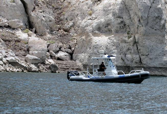 A Nevada Department of Wildlife warden patrols Lake Mead on Friday.