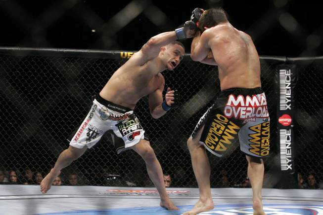 Frank Edgar, left, connects with Sean Sherk during their lightweight fight at UFC 98 at the MGM Grand Garden Arena in Las Vegas on Saturday, May 23, 2009. Edgar put on an impressive boxing performance to score a unanimous decision victory. 