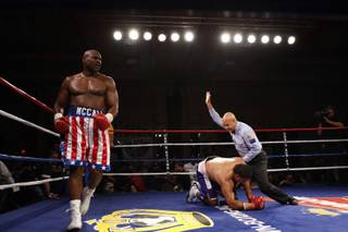 Oliver McCall walks around the ring as referee Joe Cortez calls off the fight with John Hopoate of Australia during a heavyweight bout at The Orleans Friday May 22, 2009. McCall beat Hopoate, a former rugby player, with a second-round knock out.