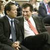 Las Vegas casino mogul Steve Wynn, right, talks with Kazuo Okada during a Gaming Commission hearing Thursday, June 17, 2004, in Carson City, where Okada received approval for a license for his Japanese Aruze Corporation to manufacture and sell slot machines in Nevada.