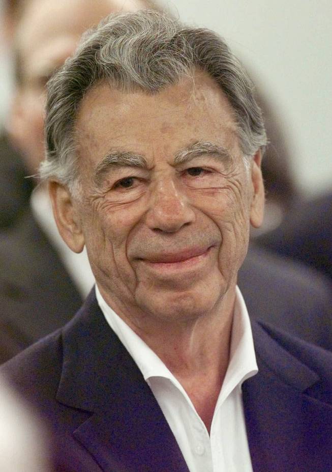 Kirk Kerkorian smiles during his appearance before the Mississippi Gaming Commission in this Thursday, May 18, 2000 file photo, in Jackson, Miss.