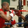 Boxer Floyd Mayweather Jr., left, works on his timing with his uncle Roger Mayweather during a workout in his gym Thursday, June 11, 2009.  Mayweather is coming out of retirement to fight Juan Manuel Marquez on July 18. 