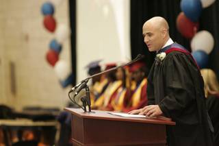 Andre Agassi speaks at the Andre Agassi College Preparatory Academy on Friday.