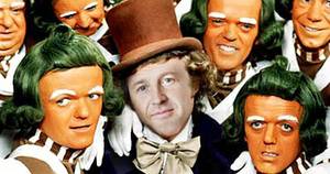 Trevor Groth (middle) with a collection of Oompa-Loompas.