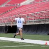 Casey Flair, former UNLV receiver, runs the 40-yard dash during the UFL workouts at Sam Boyd Stadium Saturday. Las Vegas is one of four teams in the new football league and will have former New York Giants coach Jim Fassel leading the squad.