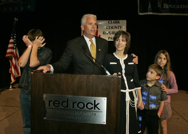 Sen. John Ensign, with his wife, Darlene, and their children, speaks to supporters during a Republican party at the Red Rock Resort on Nov. 7, 2006. 