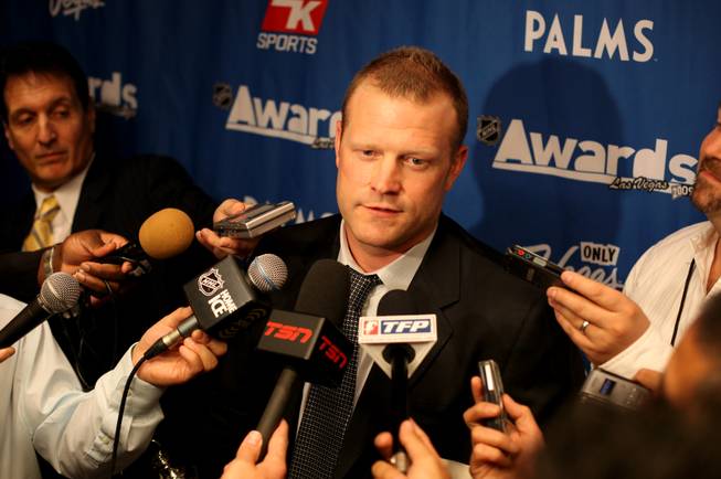 Boston Bruins goalie Tim Thomas speaks with the media on Thursday after winning the Vezina Trophy at the NHL Awards ceremony, held at the Pearl Theater at the Palms. The 35-year-old Michigan native reached a new peak in an up-and-down pro career, which has included four stints in Finland.