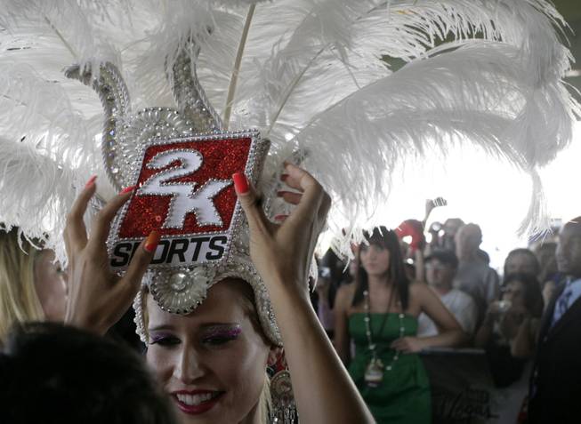 A 2K Sports show girl gets her head dress adjusted on the red carpet outside the Palms Thursday prior to the NHL Awards show.
