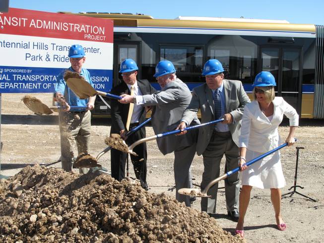 From left, County Commissioner Larry Brown, RTC General Manager Jacob Snow, Mayor Oscar Goodman, City Councilman Steve Ross and RTC Deputy General Manager Tina Quigley ceremoniously break ground for the Centennial Hills Transit Center.
