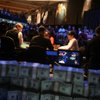 Poker pros play into the wee morning hours last June at the final table of the World Series of Poker's HORSE event, considered a top test of poker skill because of its diversity of games. Scotty Nguyen, in red, outlasted the others to win $1.9 million, but not before controversy-generating behavior including swearing at his rivals.