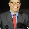 In this April 13, 2009 file photo, Al Franken talks with reporters outside his home in Minneapolis. 
