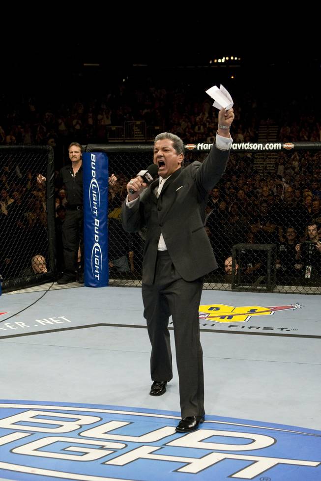 UFC ring announcer Bruce Buffer gets fully involved in his job at a recent romp in the Octagon.