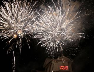 Thousands watched a fireworks display Saturday night at Caesars Palace on the Las Vegas Strip. 