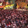 Hundreds of people crowded into the Fremont Street Experience to celebrate July 4th and listen to the Grass Roots band. 