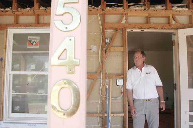 Homeowner Jack Gaal stands at the entrance to his home at 540 Birch St., in the historic home district of Boulder City. Seen here in 2008, Gaal spent two years renovating his residence.