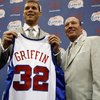 No. 1 draft pick Blake Griffin, left, stands next to Clippers head coach and general manager Mike Dunleavy while holding his jersey at a news conference Monday, June 29, 2009, at the Clippers' training center in Playa Vista, Calif. He will make his pro debut at the Thomas & Mack Center for the Clippers' summer league squad on July 13.