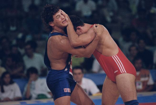 Wrestlers making choice between Olympics or MMA