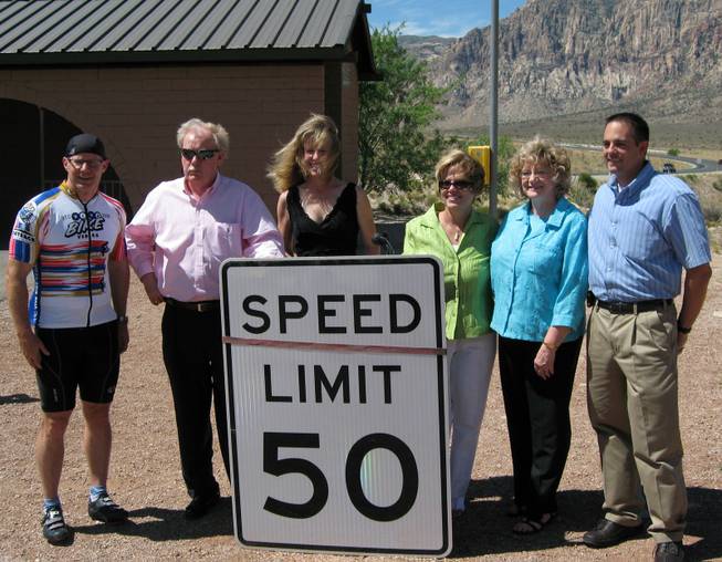 From left, RTC General Manager Jacob Snow, state Sen. Mike Schneider (D-Las Vegas), transportation department Director Susan Martinovich, state Sen. Shirley Breeden (D-Henderson), state Sen. Joyce Woodhouse (D-Henderson) and cyclist Zane Marshall pose with a 50 mph speed limit sign at the State Route 159 Safety Speed Zone celebration in July 2009.
