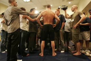 Michael Bisping talks to the media after a light workout Wednesday, July 8, 2009 at Mandalay Bay. Bisping will face off against Dan Henderson Saturday, July 11 at UFC 100.  